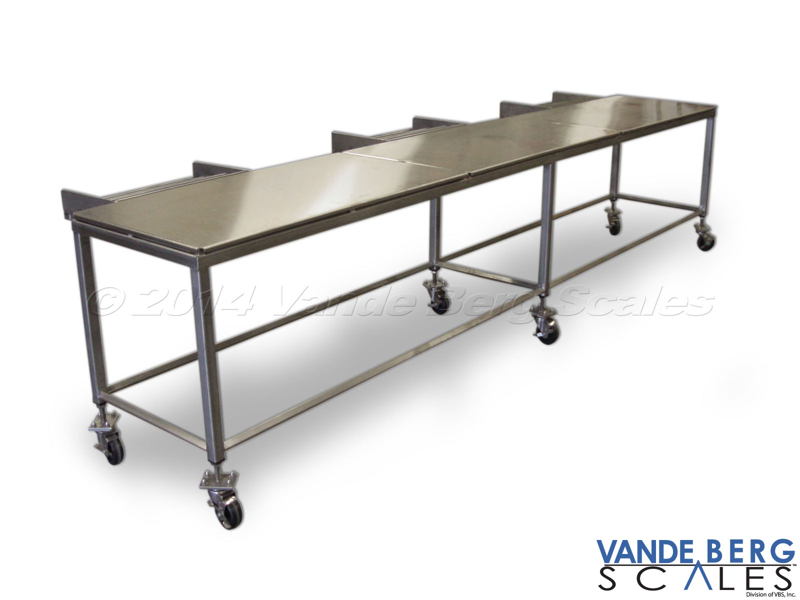 Heavy-duty stainless steel cart/table. Lockable casters permit quick change from stationary to mobile use.